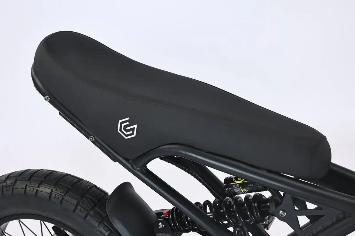 Close-up of the GhostCat F4X Pro bike seat with sleek black design and logo, showcasing durability and comfort.