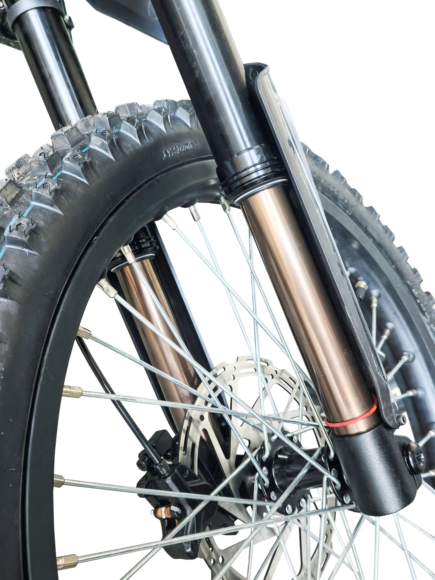 Close-up of the aluminum hydraulic front fork and tire of the Riding Times GT73 electric dirt bike.