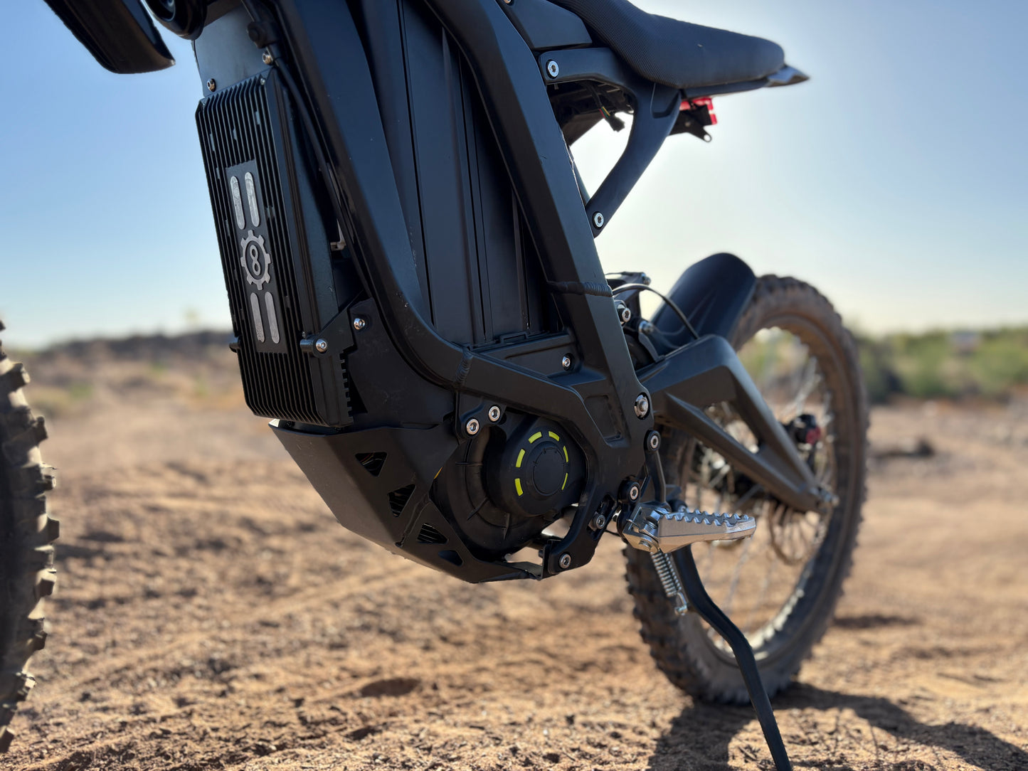 Natkie N1 Electric E Moto in Desert showing underside of bike.