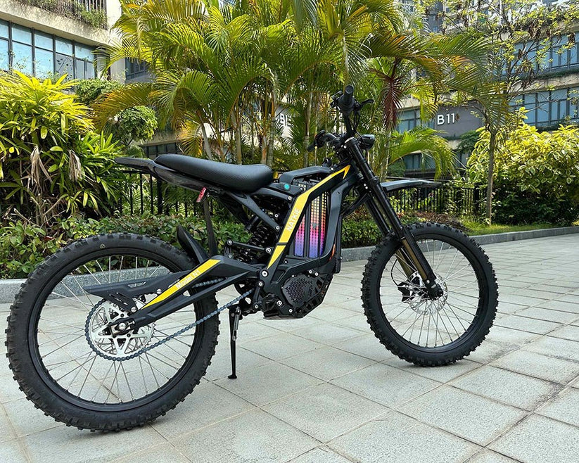 Natkie N1 Electric E Moto in a vibrant outdoor setting with lush greenery and modern architecture.