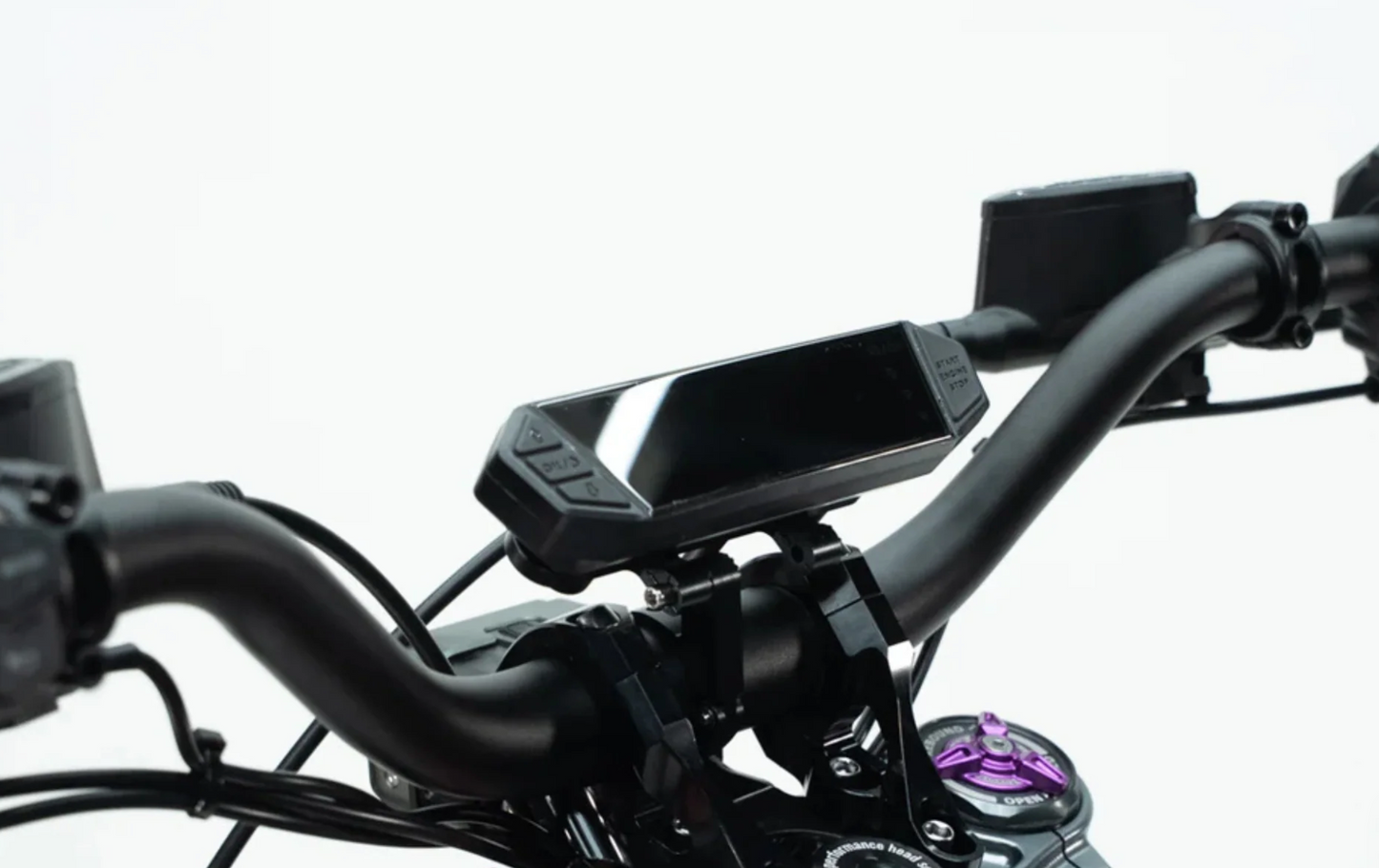 Close-up of Ventus V1+ electric dirt bike handlebars with digital display and advanced controls.