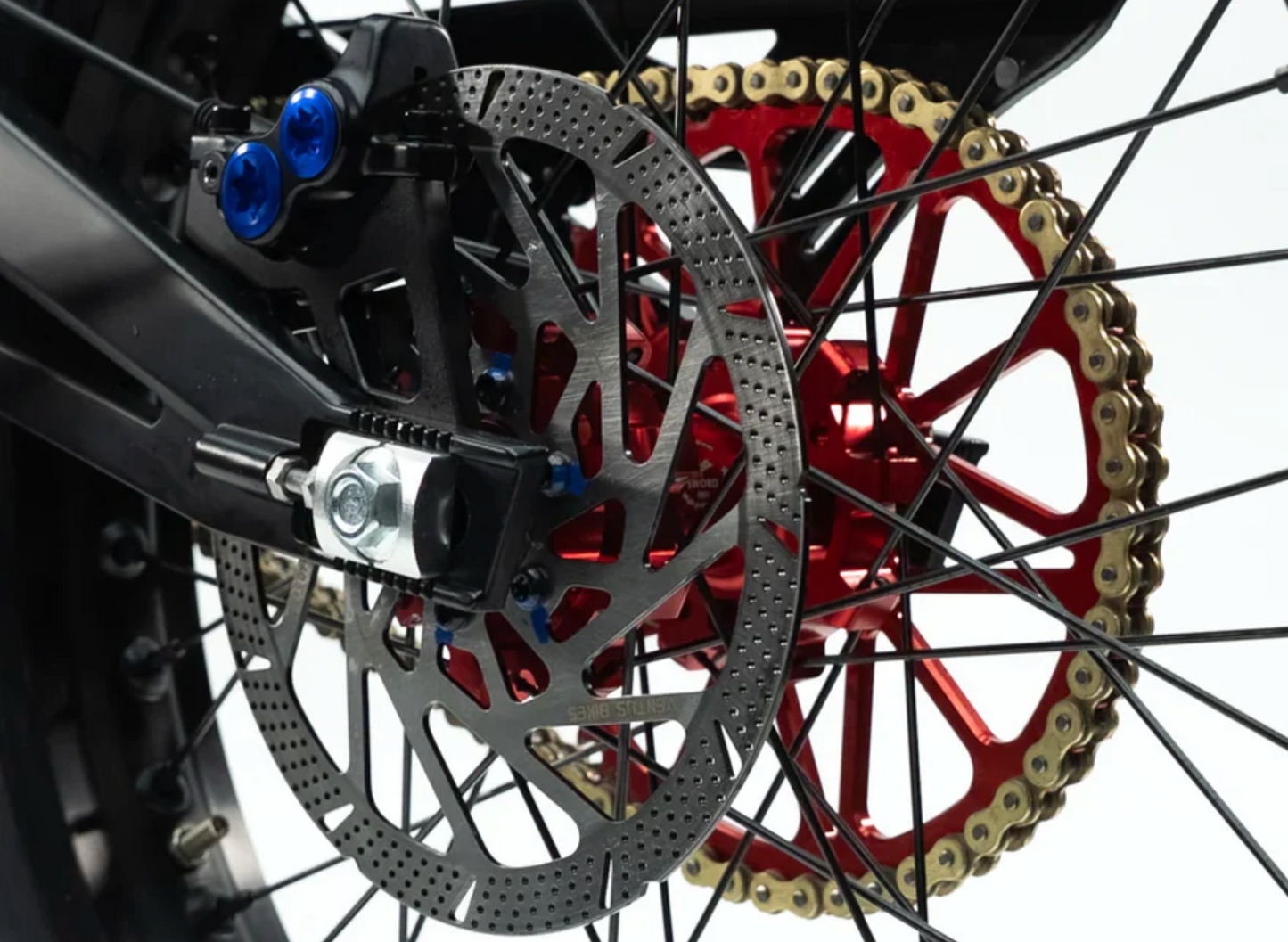 Close-up of the advanced braking system on the Ventus V1+ electric dirt bike, showcasing disc and rotor details.