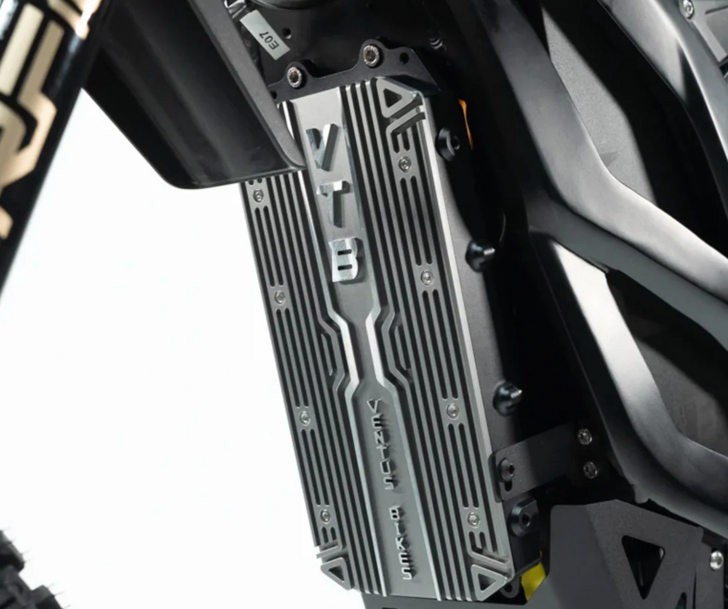 Close-up view of the Ventus V1+ electric dirt bike's VTB component, showcasing advanced engineering and design.