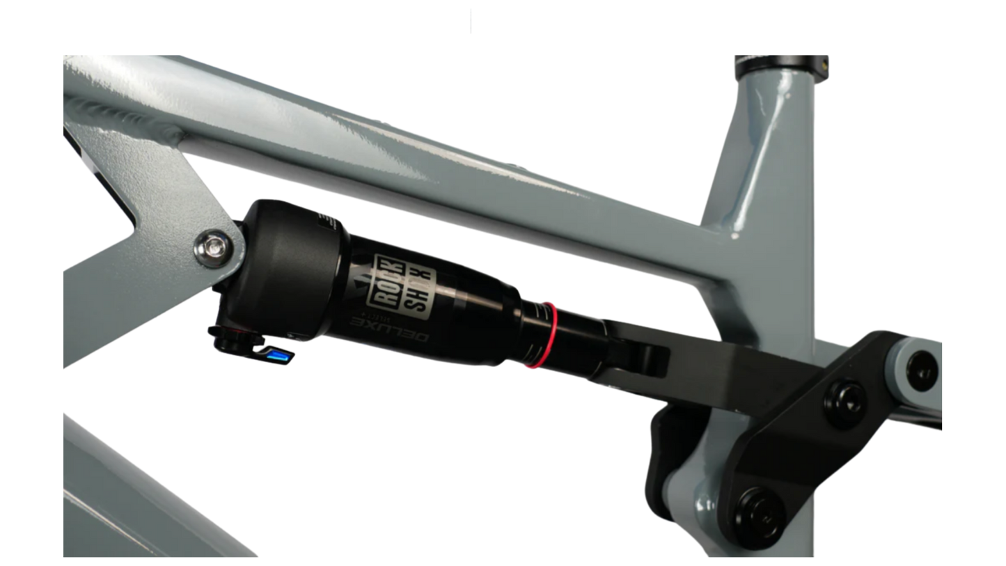 Close-up of the 2025 CyberBike Raptor Pro shock absorber, highlighting premium suspension design.