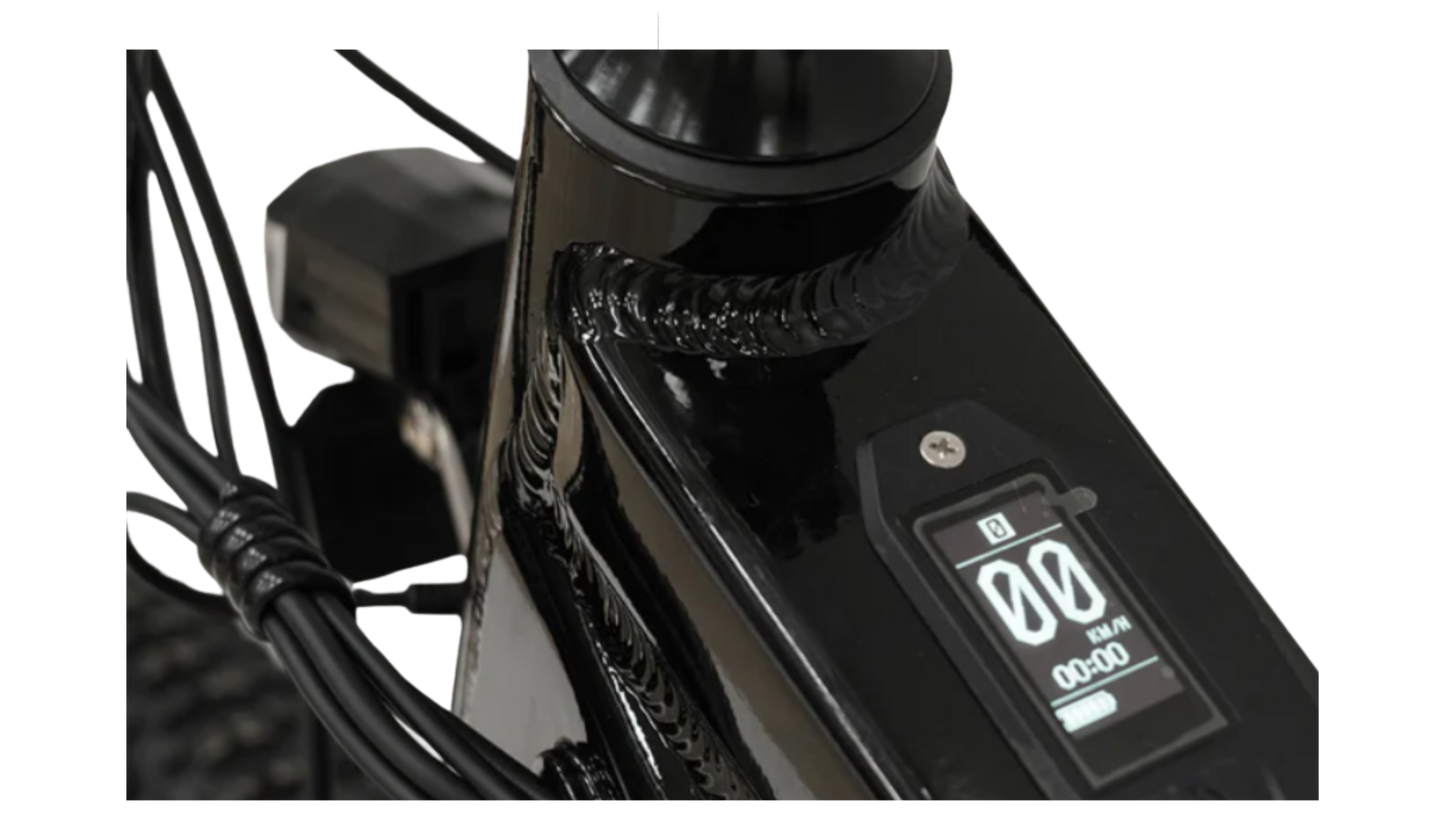 Close-up of the CyberBike Raptor Pro display showing digital metrics and sleek design.