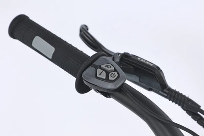 Close-up of GhostCat F4X Pro electric bike handlebars with control buttons and textured grip.