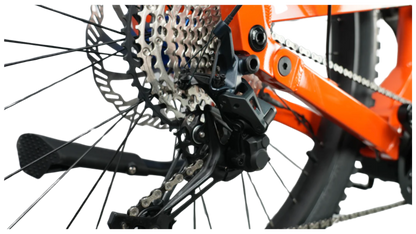 Close-up of the rear derailleur and cassette on the 2025 CyberBike Raptor Pro in Sunset Orange.
