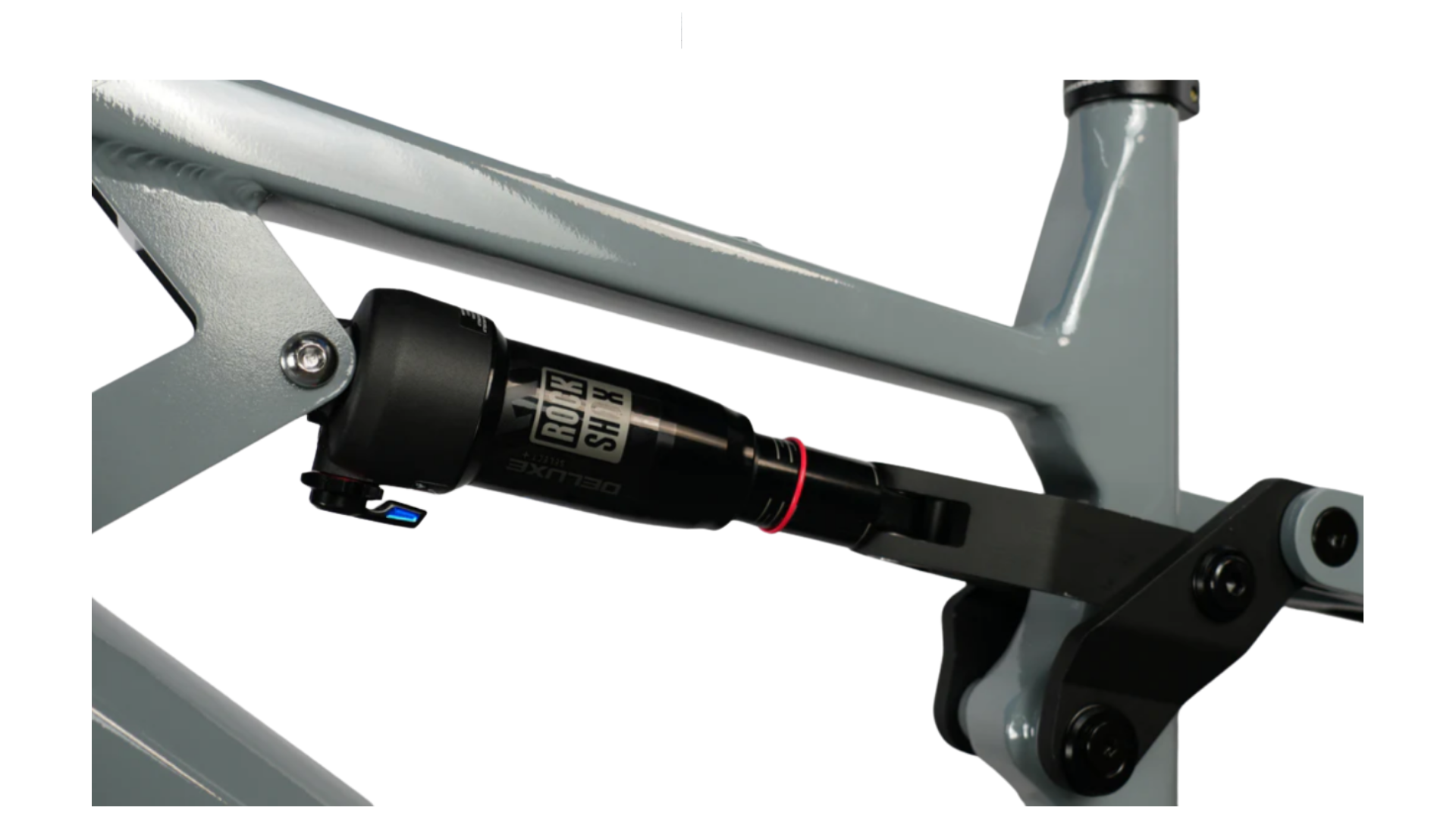 Close-up of the 2025 CyberBike Raptor Pro shock absorber, highlighting premium suspension design.