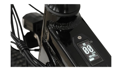 Close-up of the CyberBike Raptor Pro display showing digital metrics and sleek design.