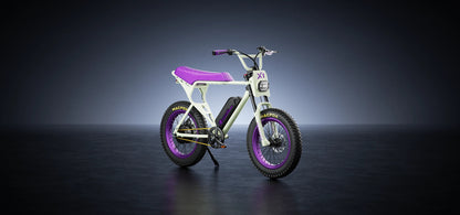 Macfox E-bike X1S with purple accents, featuring 500W motor, 25mph speed, and 500Wh battery for long-range rides.